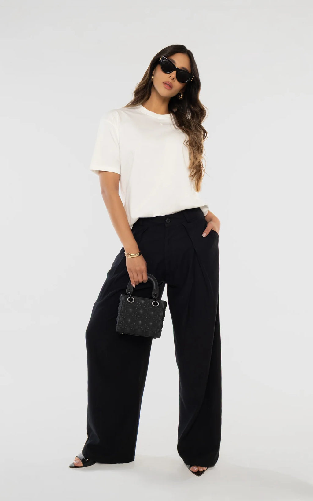 Black Pleated Tailored Pants by Navissi