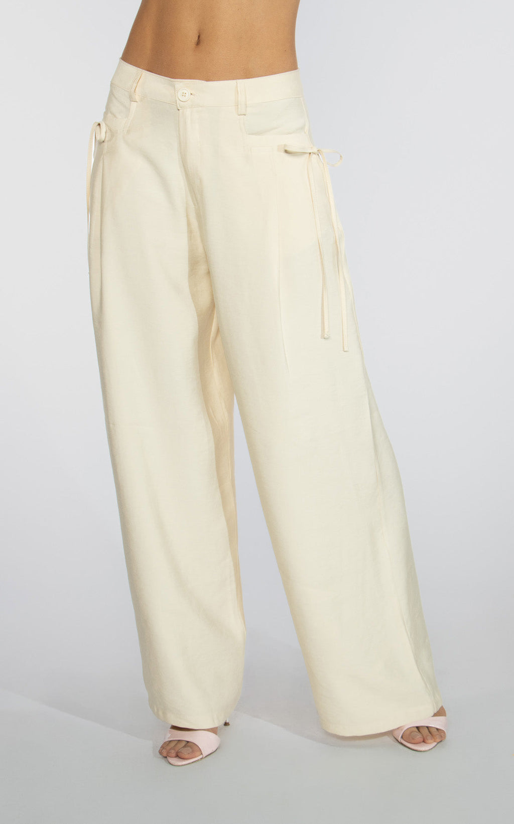 Pantalon Crema Con Bolsillo Ribete